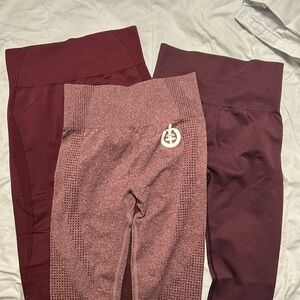 Bundle of 3 plum/dark purplish workout leggings.